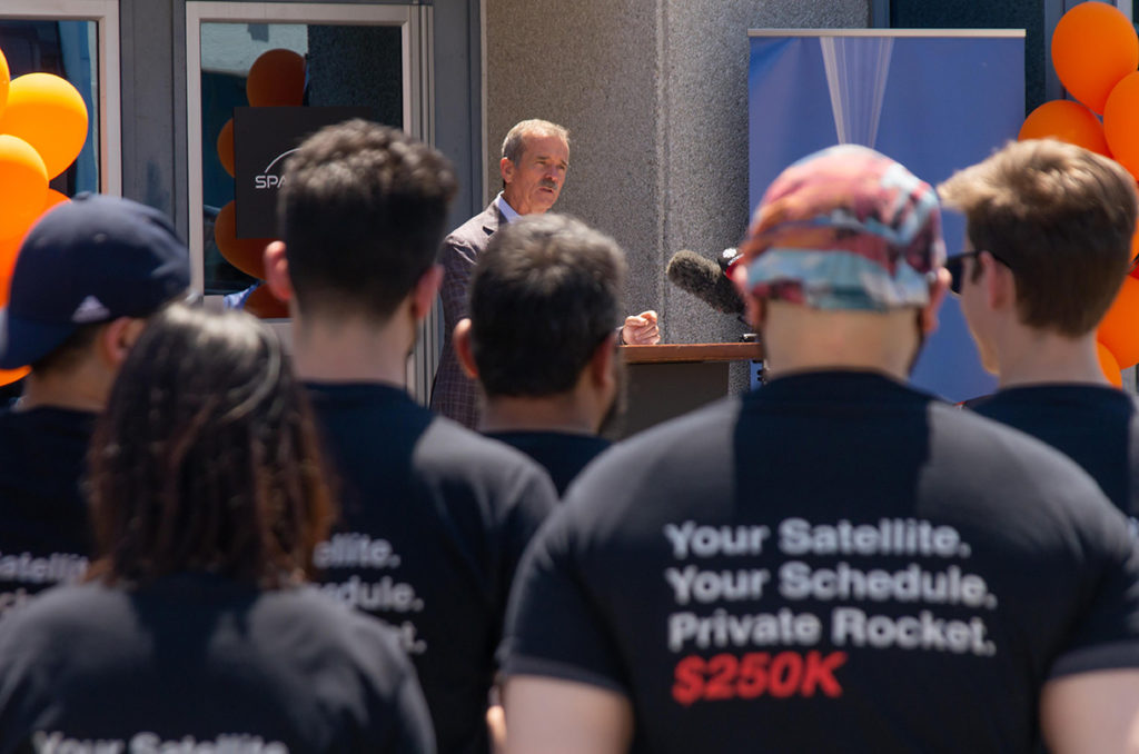 Col. Hadfield addressing media and SpaceRyde staff at their launch day.
